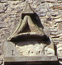 stone on a house next to Melmerby Chapel